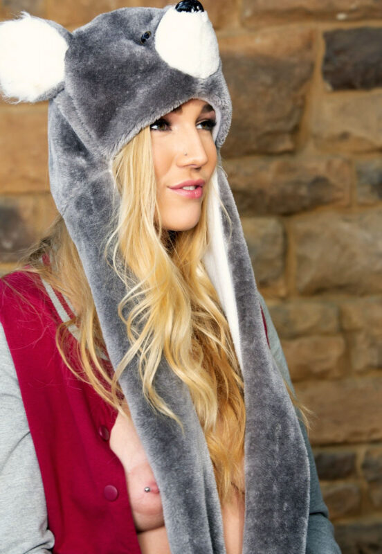 Kendra Sunderland wears a bear hat and exposes her boobs